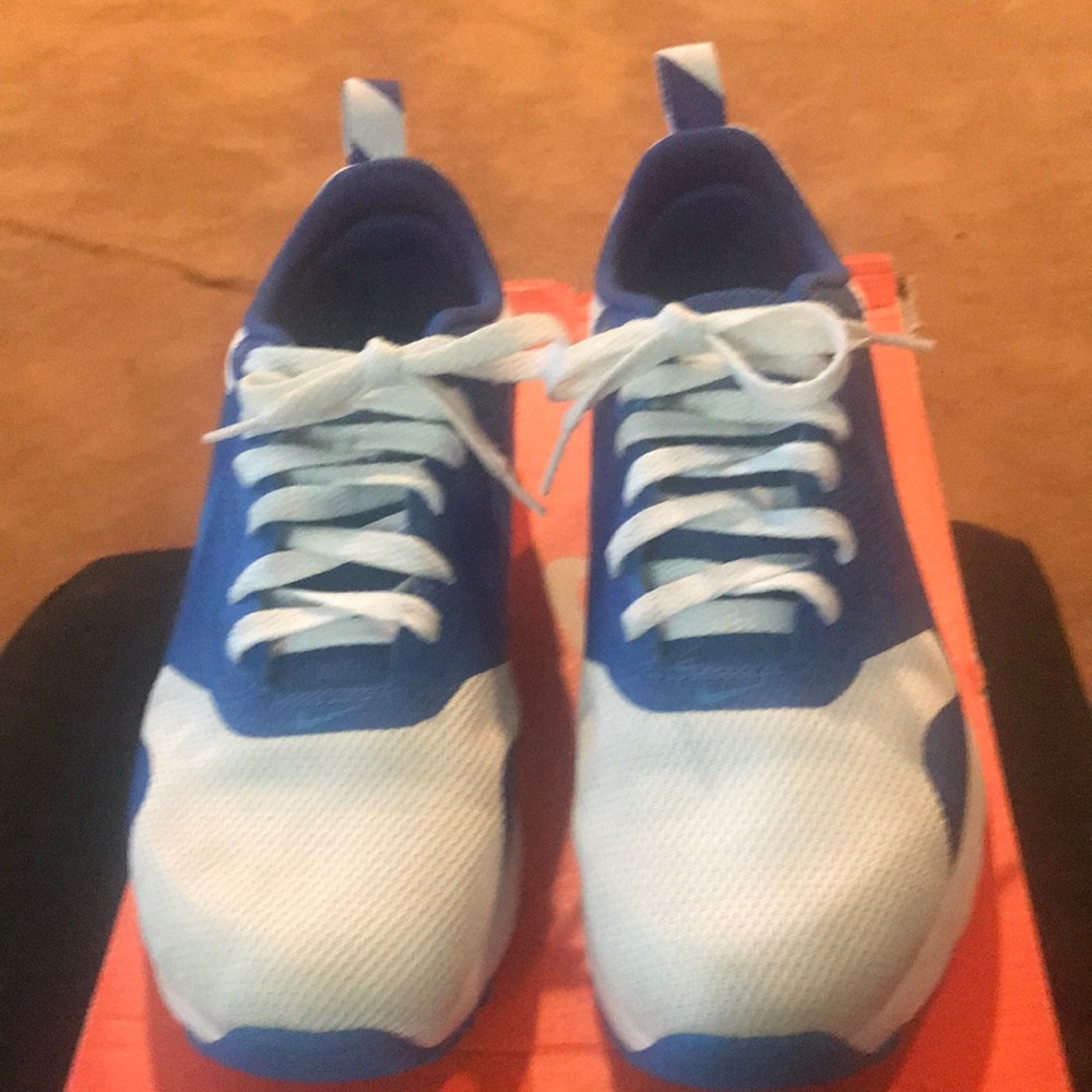 Youth Blue and white Nike sneakers